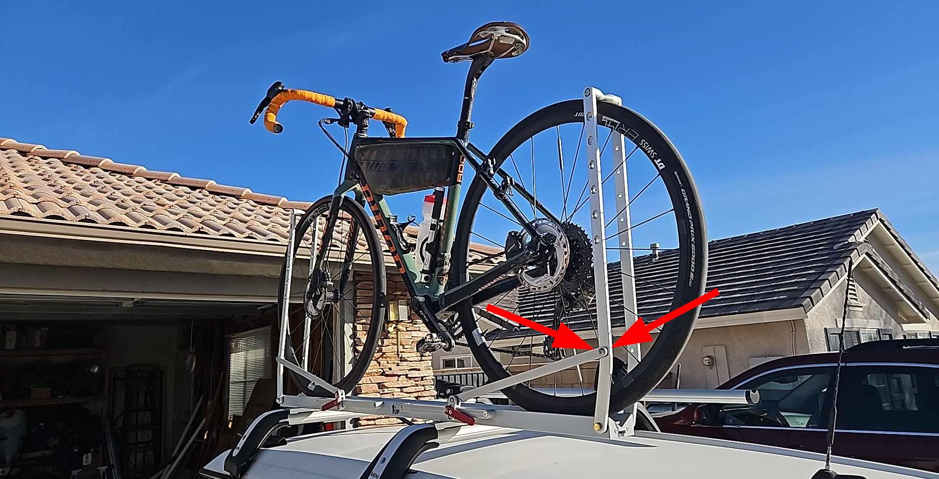 Bike on rack, indicate where rack broke
